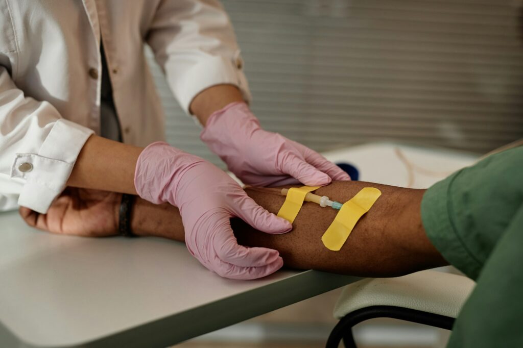 Close Up Nurse Preparing Patient For Iv Drip